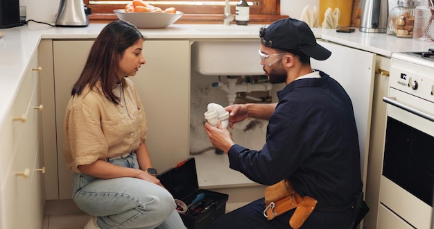 kitchen-sink-plumber-discussion-with-woman-maintenance-service-support-home-repairs-house-pipe-contractor-communication-with-customer-renovation-inspection-advice_590464-497560.jpg